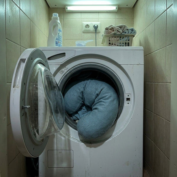 Cuddle Curve cover loaded into a washing machine drum